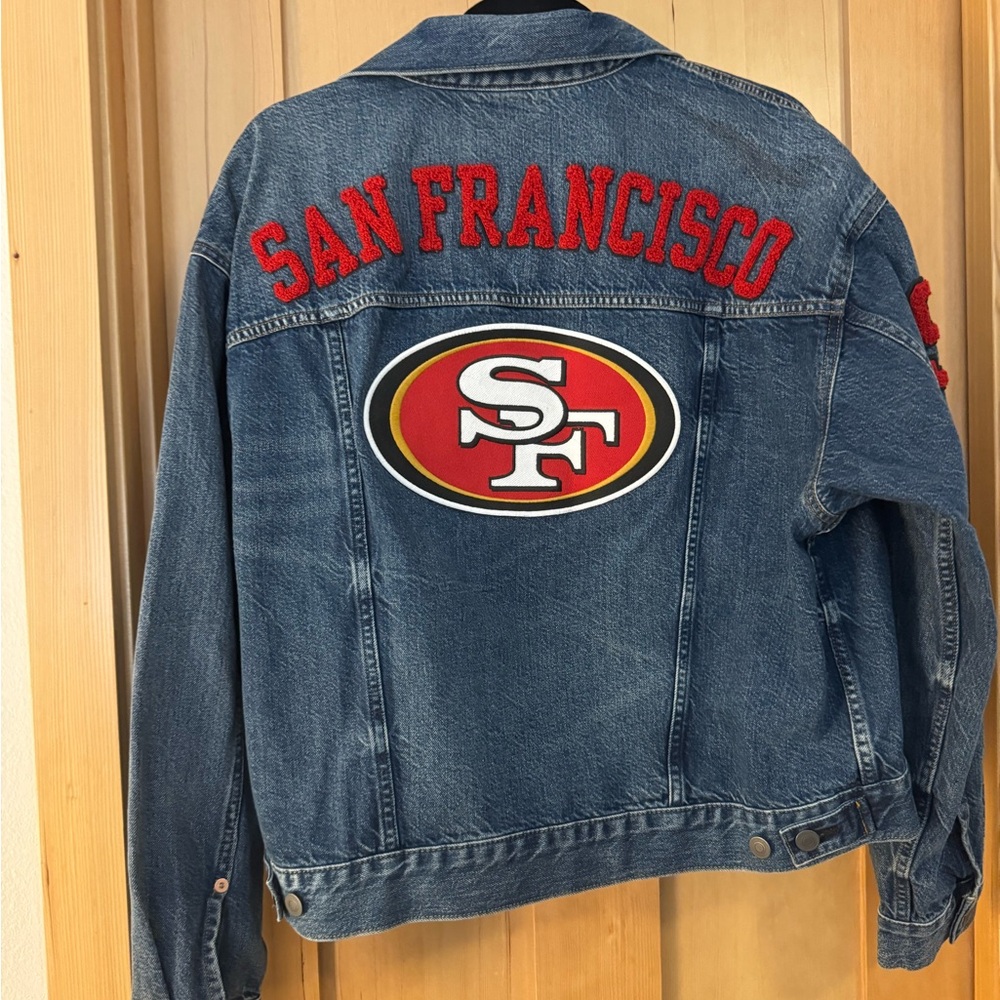 Team Apparel Blue Denim Jacket with Red Embroidered Patches - Picture 2 of 4